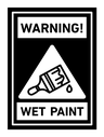 Wet paint sign black filled icon